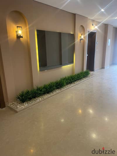 Ground floor apartment with a garden of 177 m in Village West Compound - fully finished with air conditioners - resale with installments at a very spe