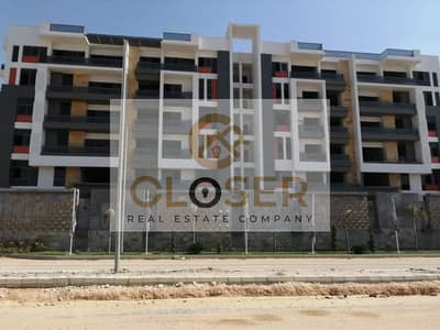 شقه للبيع بموقع مميز بجوار الجامعه الامريكيه auc the Icon gardens باقل سعر للمتر