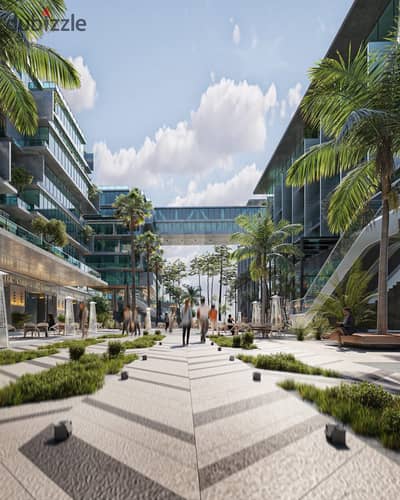 Finished office for sale with a view of the plaza on 26th of July Corridor next to Arkan Plaza in the best commercial and vibrant area in Sheikh Zayed