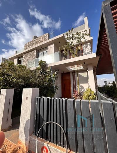 At the Price of an Apartment and Below Market Value – Ready to Move Twin Villa with a Prime View in the Finest Location at IL Bosco New Capital At the Price of an Apartment and Below Market Value – Ready to Move Twin Villa with a Prime View in the Finest Location at IL Bosco New Capital