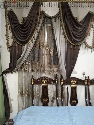 ستائر وبراقع
