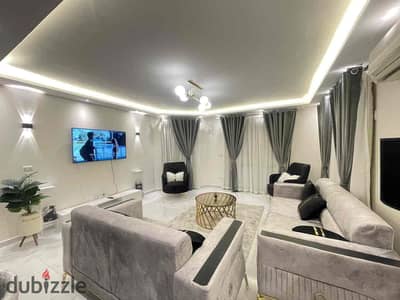 Furnished apartment for rent in Al Khamael Compound - Ground floor with garden
