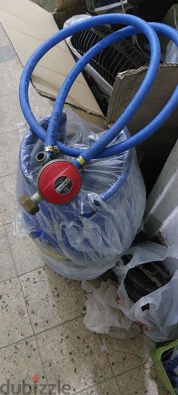 انبوبه بالخرطوم والمنظم مليانه غاز