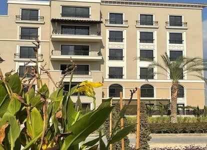 Ground floor apartment with garden for rent in Village West, Sheikh Zayed