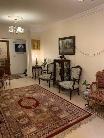 Ground floor apartment with garden for rent, furnished, in Al Rehab, prime location Near services.