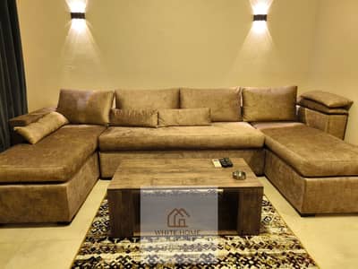 Ground floor studio with garden for rent, fully furnished, in Village Gate, prime location near the American University.