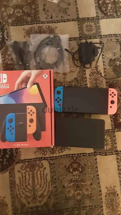 nintendo switch oled red and blue near perfect condition