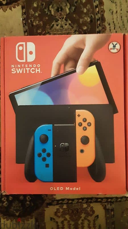 nintendo switch oled red and blue near perfect condition 1