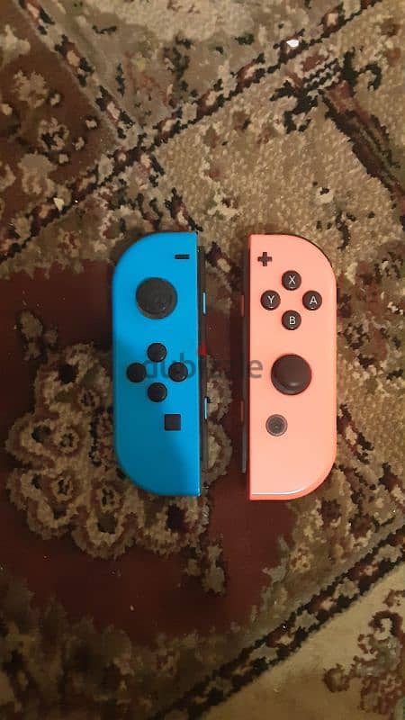 nintendo switch oled red and blue near perfect condition 4