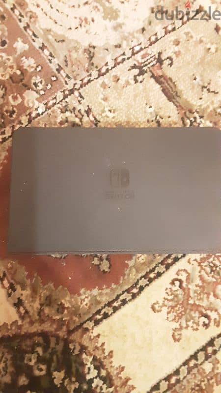 nintendo switch oled red and blue near perfect condition 5