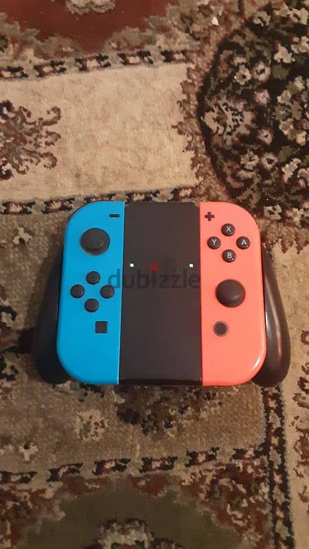 nintendo switch oled red and blue near perfect condition 6