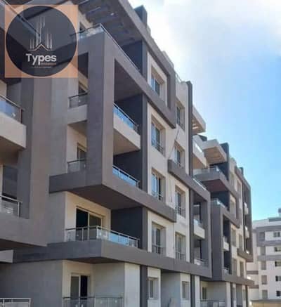 Apartment for sale in Cairo University compound, opposite Zayed 4 entrance, ground floor with a large garden.