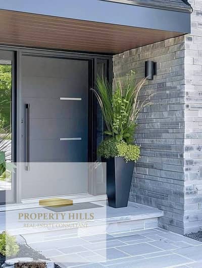 Villa for sale in New Cairo with a landscape view, ready for viewing and occupancy.