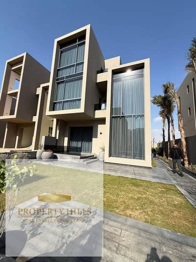 Villa for sale in Fifth Settlement, Waterway area, ready for viewing, with a spacious garden.