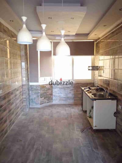 Apartment for sale in 6 October City in front of a mosque, transportation stop, and club