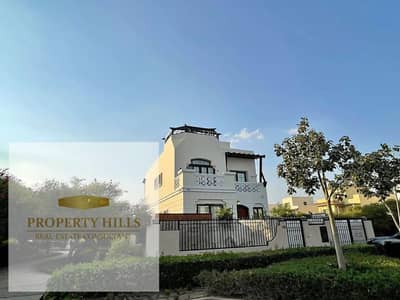 A villa in New Cairo, ready to move in, with a spacious garden and landscape view. A villa in New Cairo, ready to move in, with a spacious garden and landscape view.