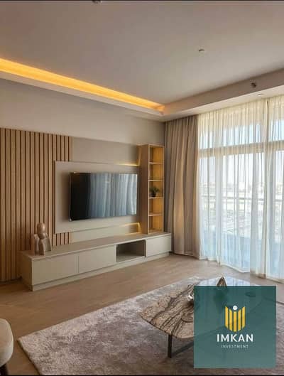 Apartment for sale in Arabesque, Fustat, ready to move in, fully finished, with a special payment plan and a distinctive view of green spaces.