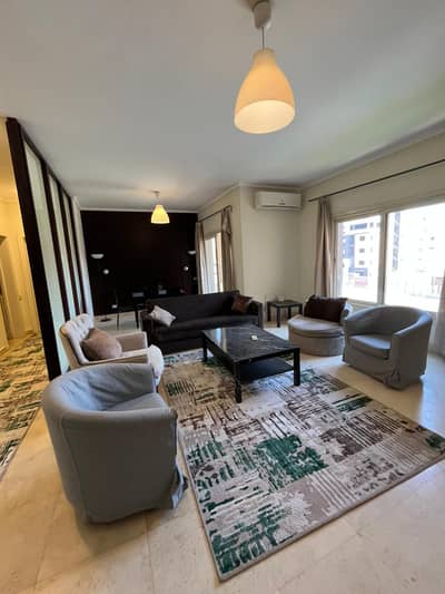 اقل سعر شقة مفروشة للايجار في كمبوند ذا فيلدج بالم هيلز التجمع القاهرة الجديدة Apartment rent The Village Palm Hills