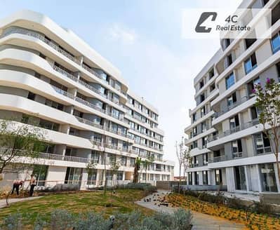 Duplex villa with corner garden for sale in Bloomfields Compound Mostakbal City New Cairo near Sarai Prime location with an open view