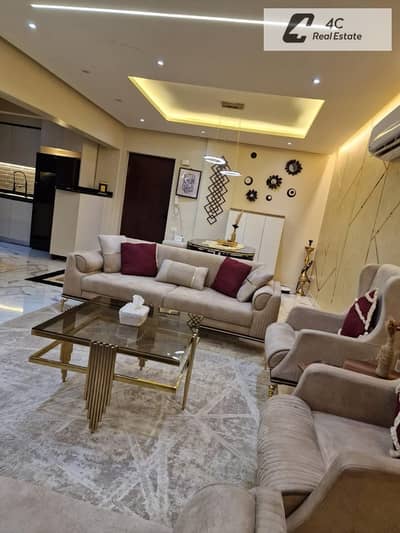 For sale at a price lower than the company's price: an ultra-super-lux finished apartment in Galleria Moon Valley, Fifth Settlement, next to the Ameri