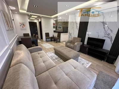 Luxury furnished apartment for rent in Madinaty with a prime location overlooking a garden