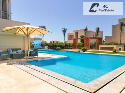 باقل مقدم وتكمله اقساط في هاسيندا باي الساحل الشمالي-شاليه بتقسيمه مميزه جاهز للمعاينه  Prime Location Direct on golf