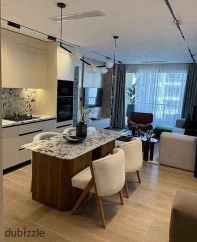 Apartment for sale with a landscape view in Genista Compound, Sheikh Zayed, next to Al Rabwa, with long-term installment plans