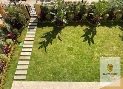 Apartment for sale at the old price, 115 meters with a garden, opposite Cairo Airport, in Taj City compound.