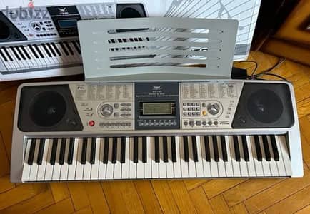 Electronic Keyboard - اورج