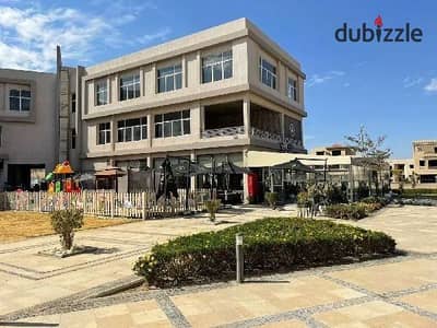 ready to move Front-facing shop for sale in Al Karma 4, Sheikh Zayed, near Beverly Hills