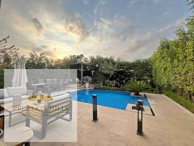 Villa for sale with a spacious garden, ready for immediate occupancy, in Katameya Gardens Prime Location compound.