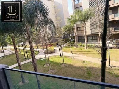 For sale, an apartment in Madinaty B15, area 147m, on the second floor, with a wide garden view to the north. It consists of 3 bedrooms, including a master bedroom and dressing area, 3 bathrooms, a reception, terrace, and kitchen. Finishing is super luxe, first occupancy.