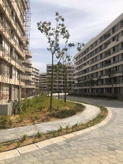 شقة (( لوكيشن مميز مع باركينج )) للبيع في بلوم فيلدز المستقبل سيتي Bloomfields el mostakbal city