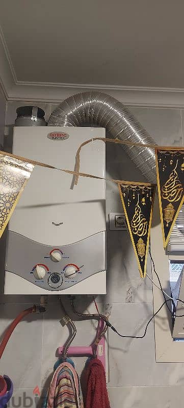 سخان غاز اوليمبك الكتريك ديجيتال مع الانبوبة