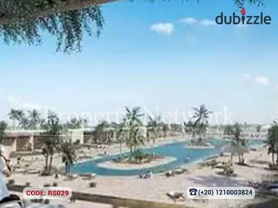 شاليه تشطيب كامل  للبيع في هاسيندا ويست – الساحل الشمالي، مرحلة اللاجون ، استلام 2027 ، موقع مميز