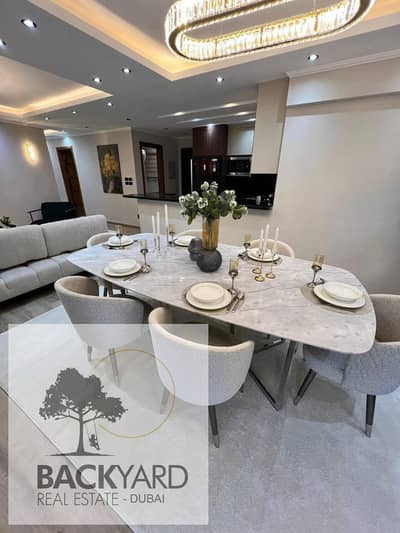 A complete furnished apartment at half its price and immediate delivery, with only 10% down payment in Compound (Mountain View 1.1)