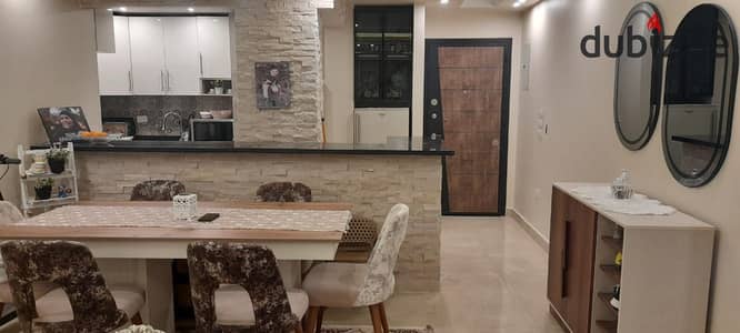 For sale, an apartment of 115m in the Sarayat Qattamiya compound, a distinctive location, super lux finishing.