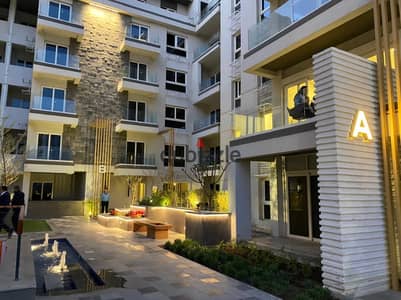 Apartment for sale with garden and immediate delivery on the Middle Ring Road in iCity Compound by Mountain View, Fifth Settlement