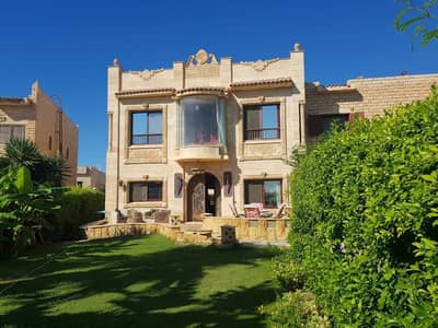 Direct on Lagoon Fully Finished and Furnished Villa for Sale in Marina 5 - North Coast