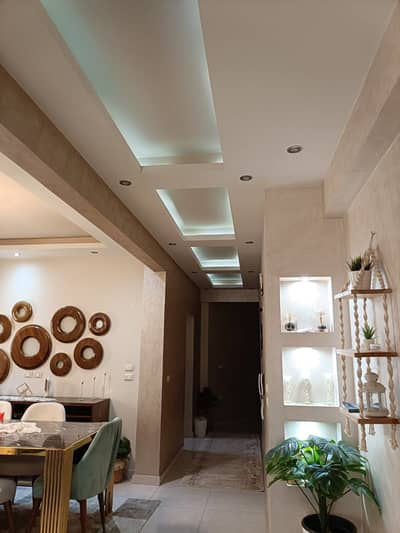 Apartment for sale, furnished in East Academy, First Settlement, high-end finishing, distinguished location. Sale includes furniture and appliances completely, first floor, share in land and roof.