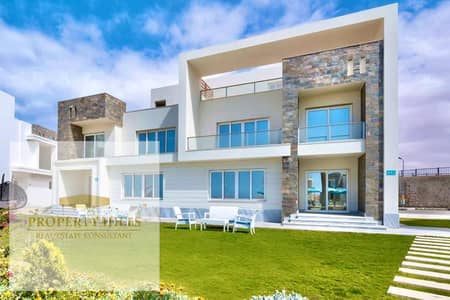 فيلا للبيع صف اول على البحر مباشر متشطبة بالكامل بخطوتين للبحر بكاش 18000.000