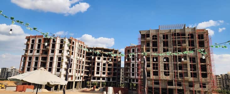 Apartment for sale in installments in Sheikh Zayed, a prime location in the Bahja compound