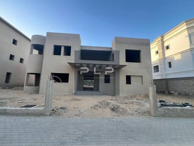Standalone villa for sale in Katameya Dunes Compound, New Cairo, prime first row location ready for immediate delivery directly on Gamal Abdel Nasser