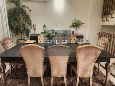 Townhouse villa for sale fully finished below market price, resale in Villeno Compound, ready to move with an open view of the landscape.