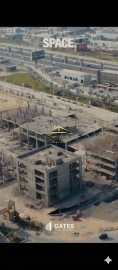 للبيع عيادة 74م مول سبيس SPACE Mall Gates علي محور 26يوليو بالقرب من مول اركان بلازا و نيو جيزهnew giza و الشيخ زايد و بالم هيلز و رويال سيتي والخمائل