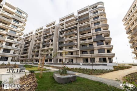 Two-bedroom apartment with a 50% discount | Direct view of the tourist promenade, R7, New Administrative Capital