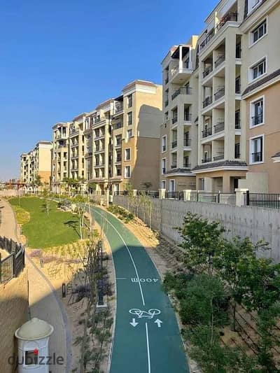 Apartment for sale with a private garden in installments in a very special location on the landscape in Mostaqbal City, Compound (Saray)