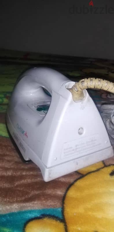 مكواه ملابس بالبخار 1