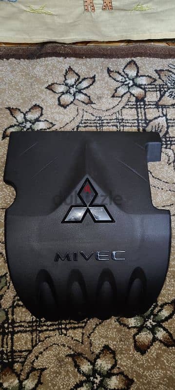 غطاء ماتور لانسر قرش الاصلي زيرو mivec