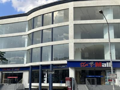 Commercial administrative mall ground and two commercial and administrative floors in the heart of 6 October complete finishing  facades skirting ready for work immediately licensed suitable for exhibitions, companies, call centers, and malls